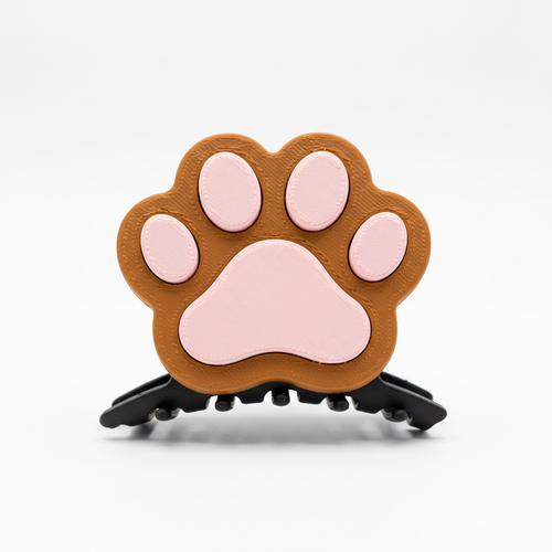3D-Printed Dog Paw Hair Claw in caramel brown and pink - standalone product shot