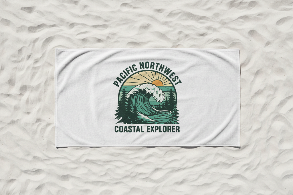 Pacific Northwest Beach Logo Towel 30x60 standalone product shot on white sand